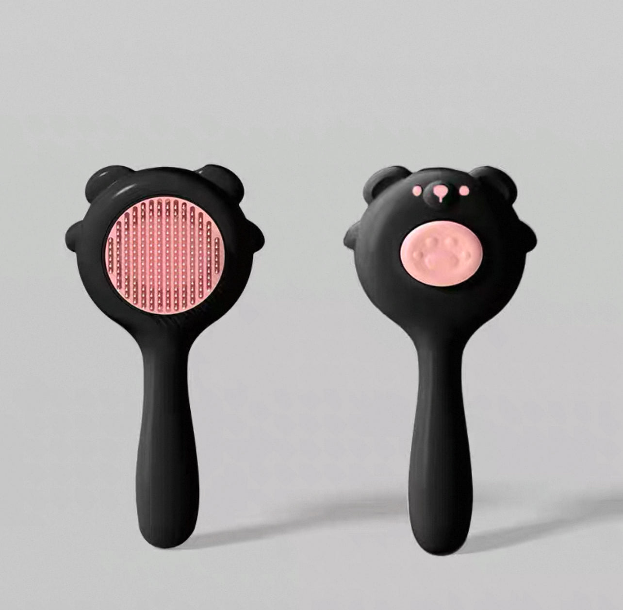 Cepillo para mascotas estilo osito con botón de autolimpieza