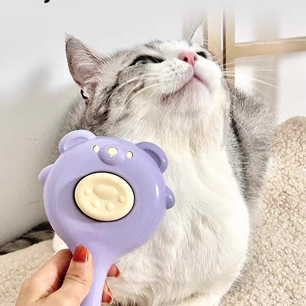 Cepillo para mascotas estilo osito con botón de autolimpieza