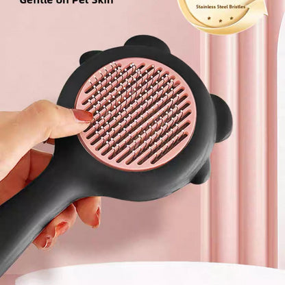 Cepillo para mascotas estilo osito con botón de autolimpieza